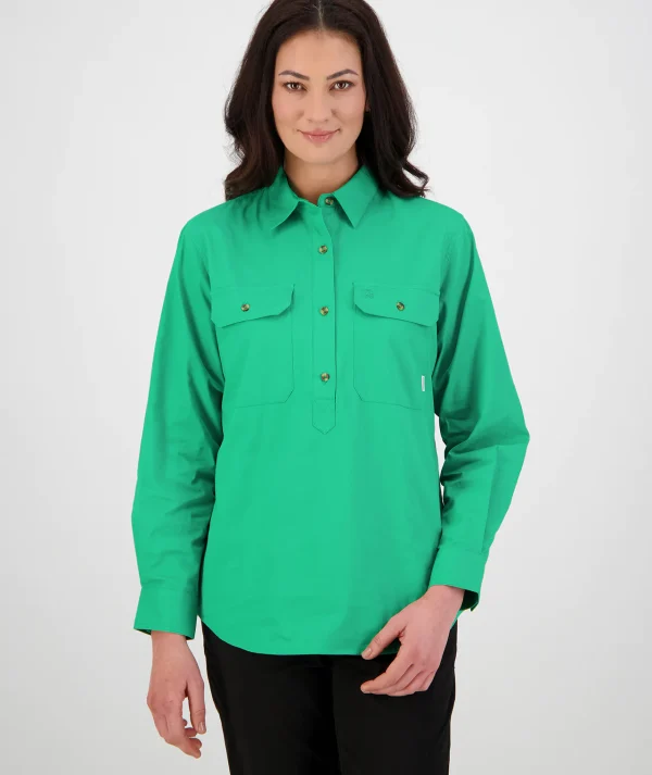 woman standing front on wearing swanndri's women's-roma-long-sleeve-shirt in green. 100% cotton, 152gsm Button flap chest pockets Half placket button opening Centre back box pleat