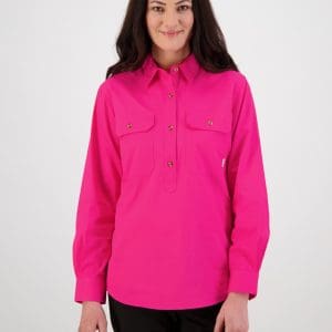 woman standing front on wearing swanndri's women's-roma-long-sleeve-shirt in bright pink. 100% cotton, 152gsm Button flap chest pockets Half placket button opening Centre back box pleat