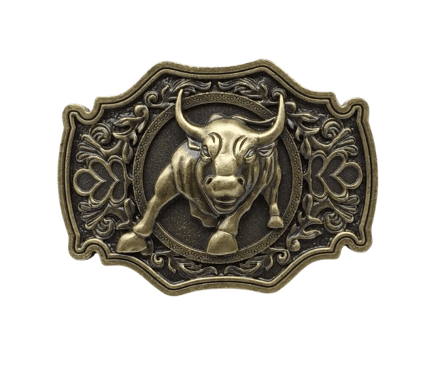 Product description ad for Bull 3D Belt Buckle. A bronze coloured rectangular belt buckle with fine ornate decoration surrounding a bull that's coming at you head on. The detailing in the bull shows that he means business and illustrates strength like only a bull can.